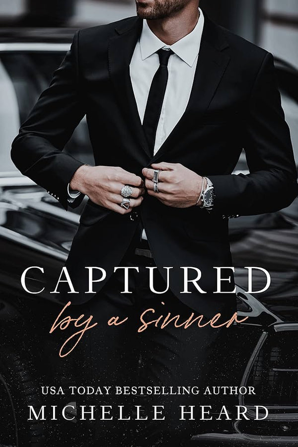 Captured by a Sinner By Michelle Heard